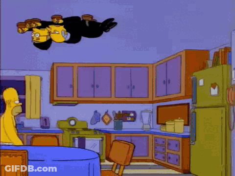 A Cartoon Of Homer Simpson Holding A Piece Of Cheese With The Caption Sixty-Four Slices Of American Cheese GIF