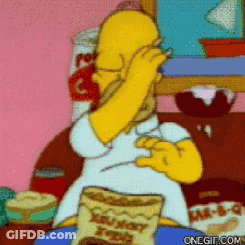 A Cartoon Of Homer Simpson Sitting On A Couch With A Bag Of Honey Bunches Of Oats GIF