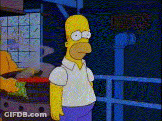 A Cartoon Of Homer Simpson Standing In Front Of A Fence GIF