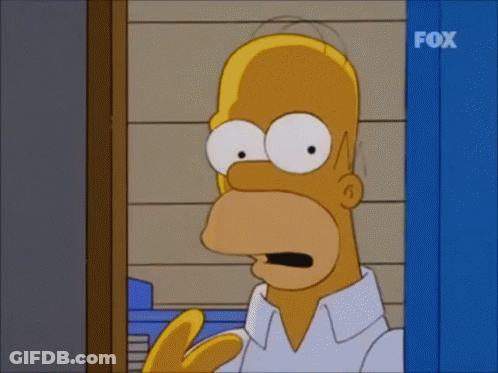 A Cartoon Of Homer Simpson Standing In Front Of A Fox Sign GIF