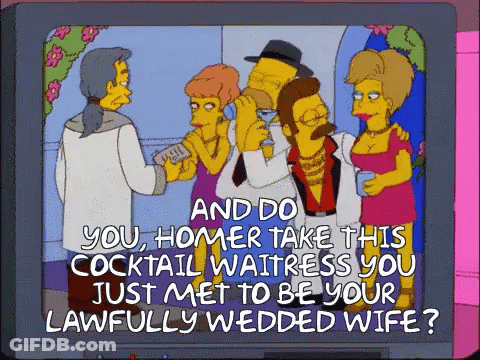 A Cartoon Of Homer Simpson Talking To His Wife GIF