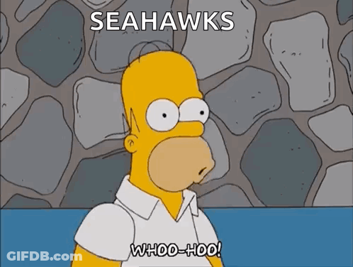 A Cartoon Of Homer Simpson With The Words Seahawks Whoo-Hoo On The Bottom GIF