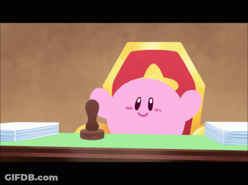 A Cartoon Of Kirby Sitting At A Desk With A Stamp GIF