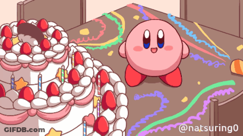 A Cartoon Of Kirby Standing Next To A Birthday Cake With Candles GIF