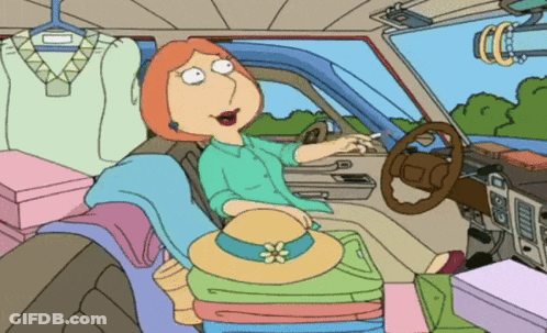 A Cartoon Of Lois Griffin Sitting In A Car Full Of Clothes GIF