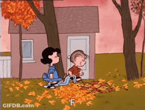 A Cartoon Of Lucy And Linus Peanuts Playing With Leaves In Front Of A House . GIF
