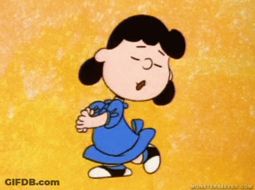 A Cartoon Of Lucy Brown From The Peanuts Movie Is Dancing . GIF