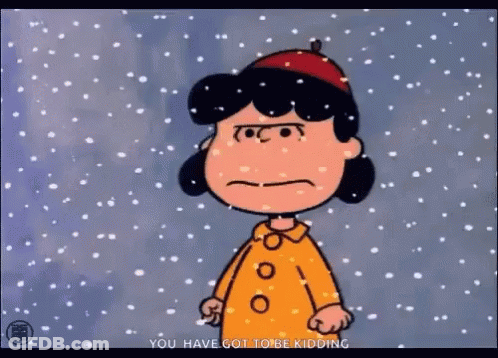 A Cartoon Of Lucy Brown Standing In The Snow GIF