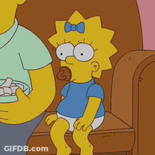 A Cartoon Of Maggie Simpson Sitting On A Couch With A Pacifier In Her Mouth GIF