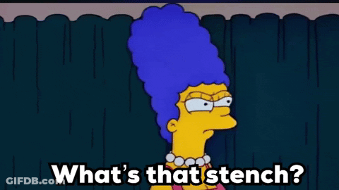 A Cartoon Of Marge Simpson With Blue Hair And The Words `` What 'S That Stench ? '' GIF