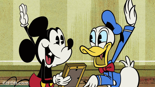 A Cartoon Of Mickey Mouse And Donald Duck GIF