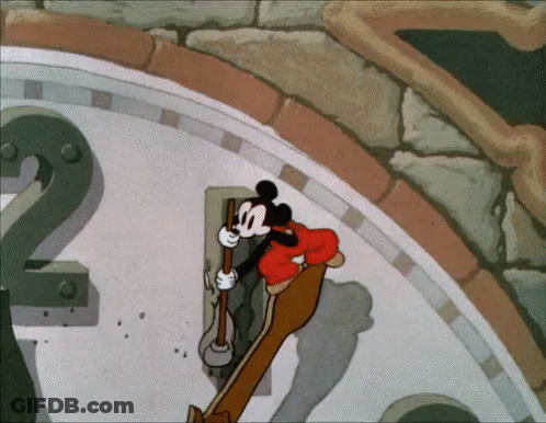 A Cartoon Of Mickey Mouse Cleaning A Clock With The Number 2 GIF