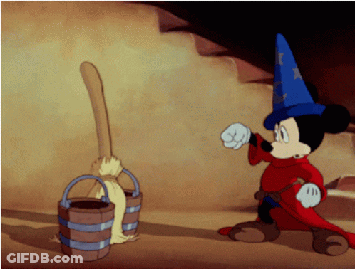 A Cartoon Of Mickey Mouse In A Wizard Outfit GIF