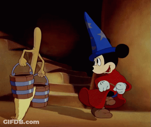 A Cartoon Of Mickey Mouse In A Wizard Outfit GIF