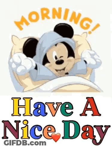A Cartoon Of Mickey Mouse Laying In Bed With The Words Morning Have A Nice Day Below Him GIF
