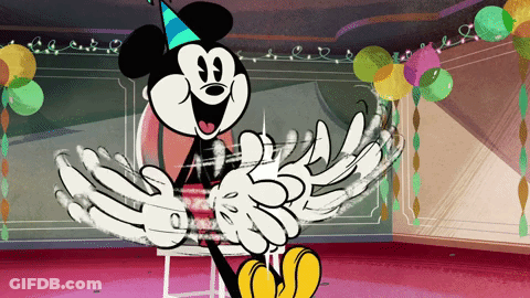 A Cartoon Of Mickey Mouse Wearing A Party Hat And Gloves GIF