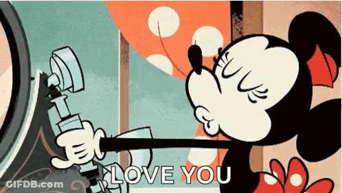 A Cartoon Of Minnie Mouse Holding A Pipe And Saying I Love You . GIF