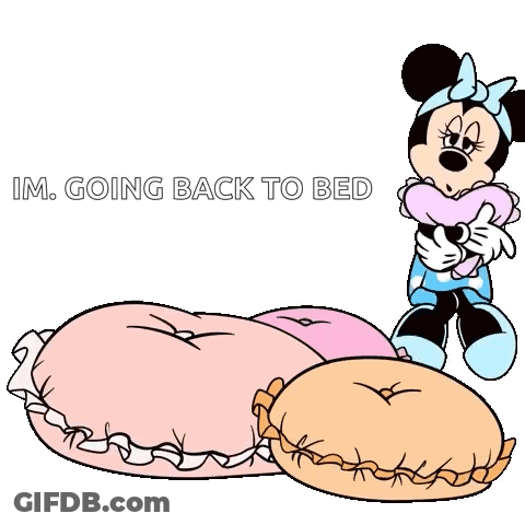 A Cartoon Of Minnie Mouse Laying On A Bed Holding A Pillow And Saying `` Im Going Back To Bed '' . GIF
