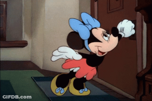 A Cartoon Of Minnie Mouse Standing In Front Of A Door Waving GIF