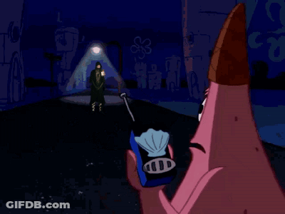 A Cartoon Of Patrick Holding An Ice Cream Cone With The Words He 'S Just Standing There GIF