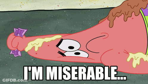 A Cartoon Of Patrick Star Laying On The Ground With The Words I 'M Miserable GIF