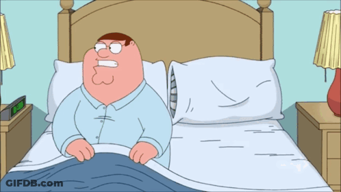 A Cartoon Of Peter Griffin Laying In A Bed GIF