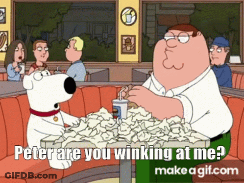 A Cartoon Of Peter Griffin Sitting At A Table With A Pile Of Papers . GIF