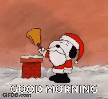 A Cartoon Of Snoopy Dressed As Santa Claus Blowing A Trumpet . GIF