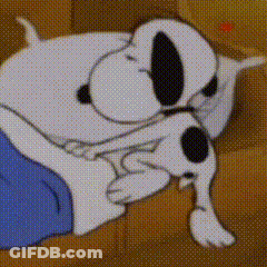 A Cartoon Of Snoopy Laying On A Couch With A Dog GIF