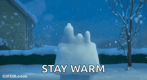A Cartoon Of Snoopy Sitting On Top Of A Snow Sculpture With The Words " Stay Warm " Below Him GIF