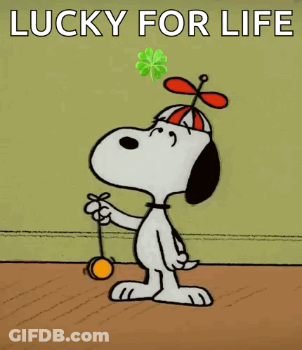 A Cartoon Of Snoopy With A Clover On His Head And The Words Lucky For Life Above Him GIF