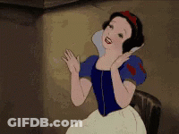 A Cartoon Of Snow White Is Sitting In A Chair And Smiling . GIF