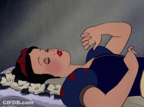 A Cartoon Of Snow White Laying On A Pillow With Her Eyes Closed GIF