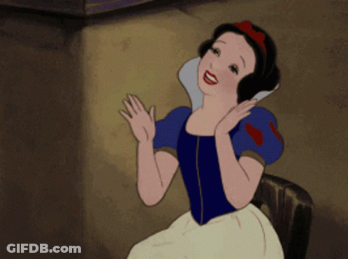 A Cartoon Of Snow White Sitting On A Chair GIF