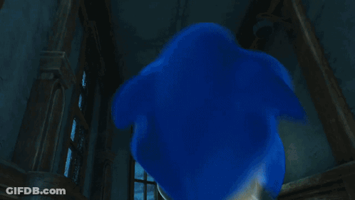 A Cartoon Of Sonic The Hedgehog Standing In A Room GIF