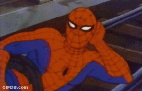 A Cartoon Of Spider-Man Laying On The Tracks Of A Train . GIF
