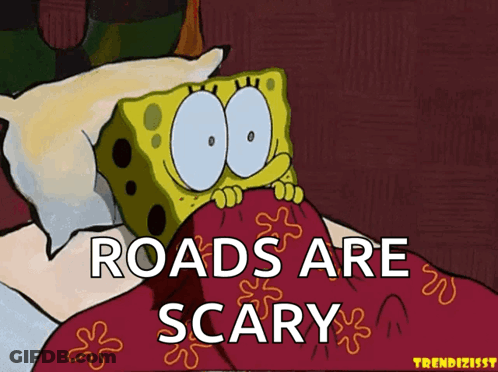 A Cartoon Of Spongebob Laying In Bed With The Words Roads Are Scary Above Him GIF