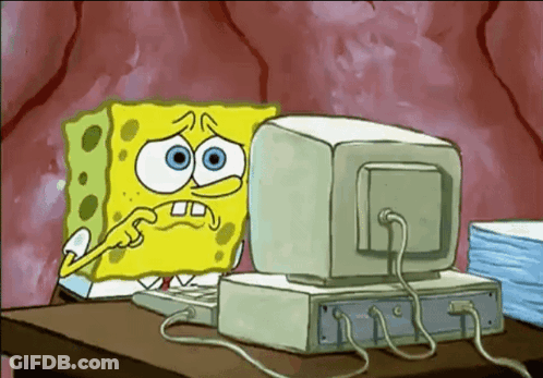 A Cartoon Of Spongebob Squarepants Looking At A Computer Monitor GIF