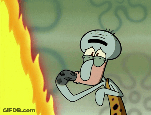 A Cartoon Of Squidward From Spongebob Squarepants Eating A Cookie GIF