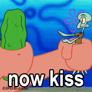 A Cartoon Of Squidward Sitting On Patrick 'S Finger With The Words Now Kiss Above Him GIF
