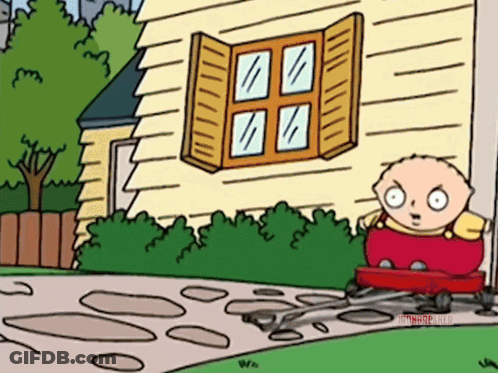A Cartoon Of Stewie Griffin Driving A Red Toy Car GIF