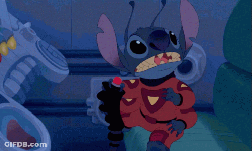 A Cartoon Of Stitch Holding A Red Light In His Mouth GIF