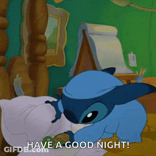 A Cartoon Of Stitch Laying On A Bed With The Caption Have A Good Night GIF