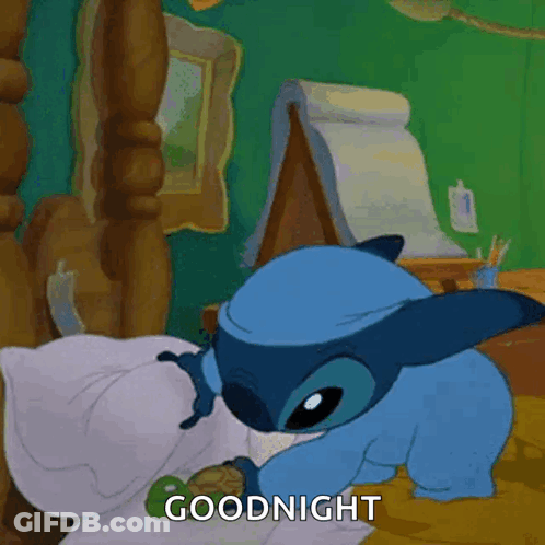 A Cartoon Of Stitch Laying On A Bed With The Words Goodnight Below Him GIF