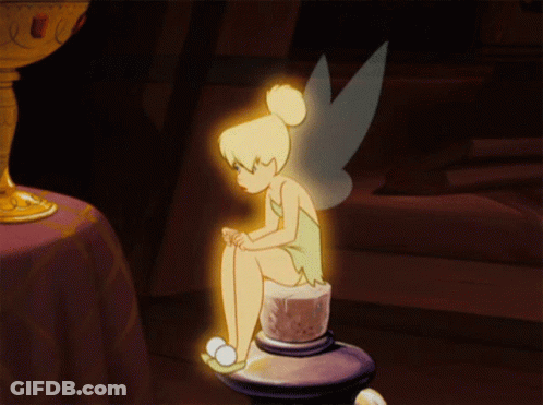 A Cartoon Of Tinkerbell Sitting On A Candle Holder GIF