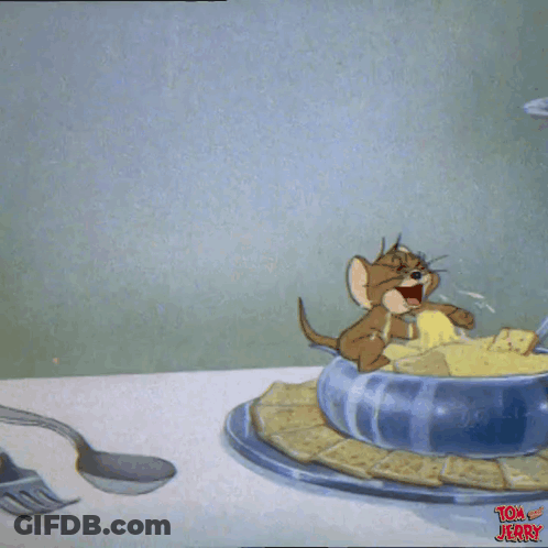 A Cartoon Of Tom And Jerry Eating A Bowl Of Cheese GIF