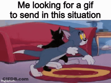 A Cartoon Of Tom And Jerry Hugging Each Other In A Living Room . GIF