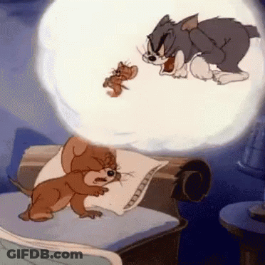 A Cartoon Of Tom And Jerry Laying On A Bed With A Speech Bubble Coming Out Of Their Mouths . GIF