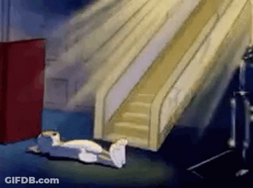 A Cartoon Of Tom And Jerry Laying On The Floor Next To A Slide . GIF
