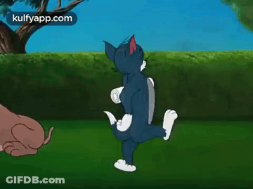 A Cartoon Of Tom And Jerry Playing With A Dog . GIF
